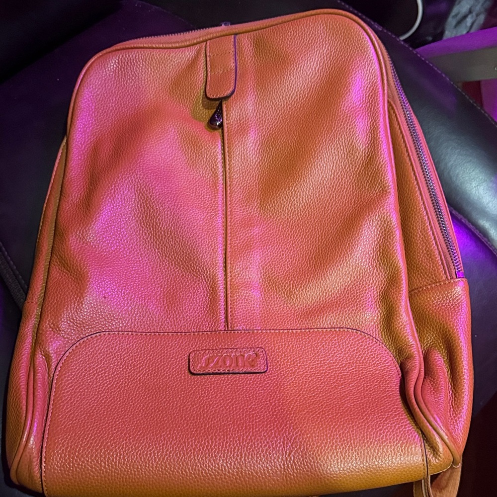 Deep tan/light brown Leather Backpack. Butter soft and barely used.